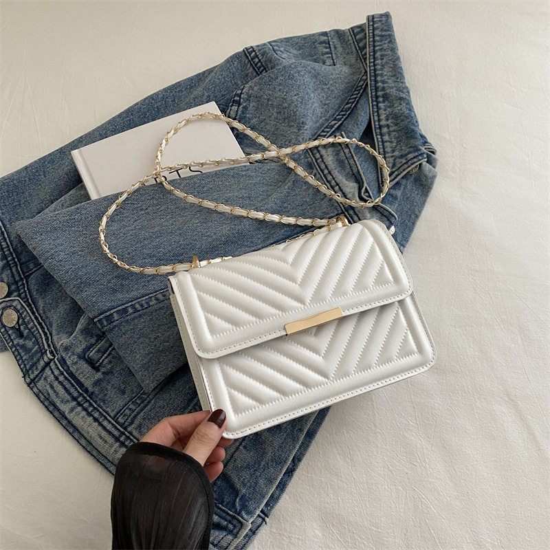 Este año, la nueva tendencia de alta calidad de la cadena de diamante, bolsos cuadrados, bolsos de moda de hombro simple, bolsos de mujer.