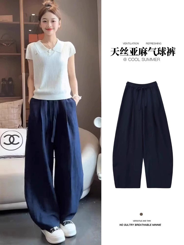 Pantalones anchos de seda helada azul marino para mujer, novedad primavera 2026, pantalones casuales rectos de lino Tencel de cintura alta y caída fluida.