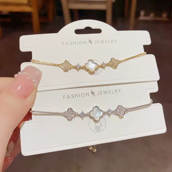 White imitation mother-of-pearl four-leaf clover bracelet with diamonds for women, exquisite and high-end, lucky clover, light luxury, niche and elegant jewelry