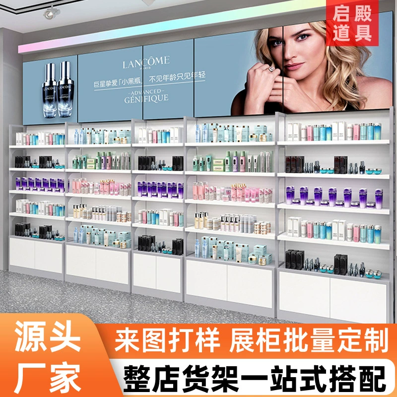 Серо-белый настенный витринный шкаф для косметики с верхней полкой-светильником, изготовленный на заказ компанией-производителем витринных шкафов из Гуанчжоу для экспорта в Россию.