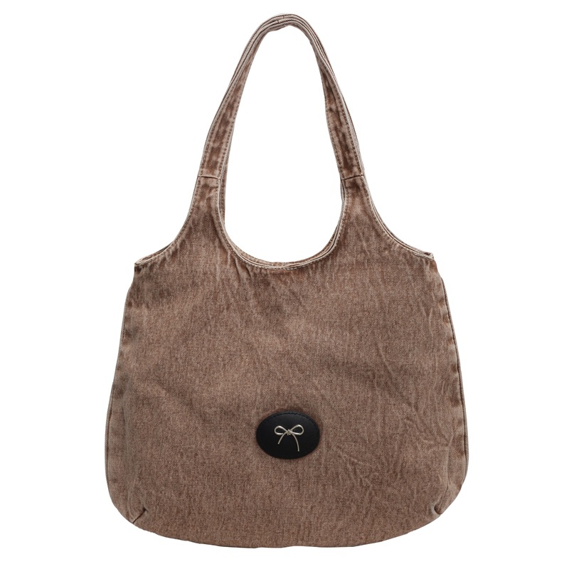 Bolso de viaje retro de mezclilla de alta gama, bolso de viaje de marca de moda de moda femenina, bolso de axila de hombro simple y casual de gran capacidad