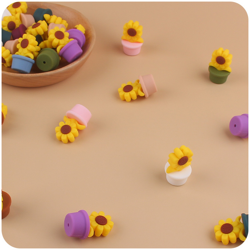 Nuevo bebé suministros de dibujos animados girasol mordedor creativo DIY bebé chupete cadena pulsera accesorios de juguete