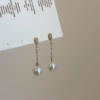 Earrings drop-shaped with tassels from pearl, diamond encrusted, 10mm