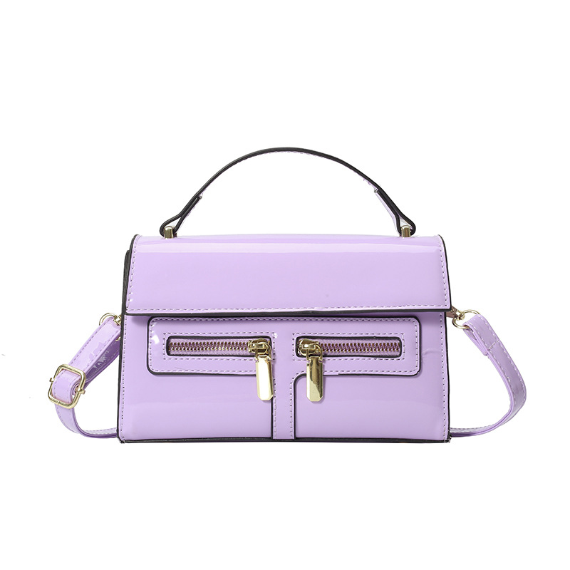 Bolso de diseño de nicho 2025 verano nuevo bolso femenino de alta calidad textura bolso de hombro charol brillante bolso de mensajero marea