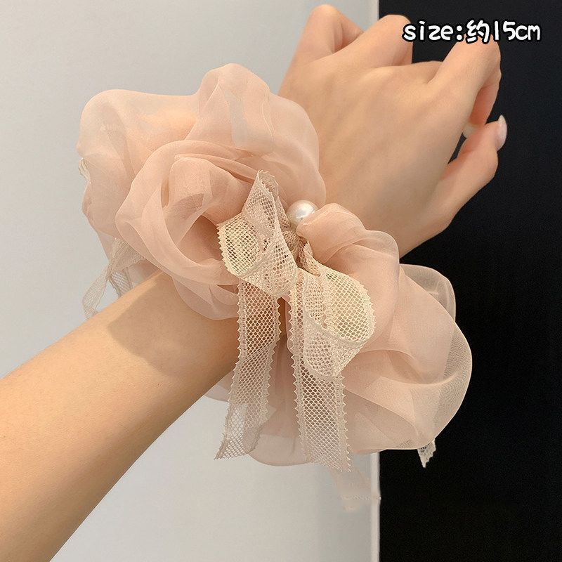 Cuerdas de cabello de viento pastoral pequeñas y altos valores faciales, anillo de cabello de intestino grande, sensación de una niña de banda de goma flácida, cuerdas de malla de banda de bola de cabeza