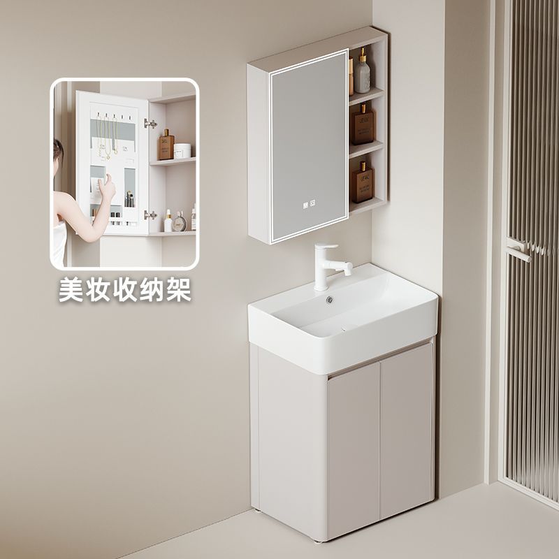 Crema pequeño apartamento gabinete de baño piso combinación espacio engrosado panal lavabo de cerámica integrado