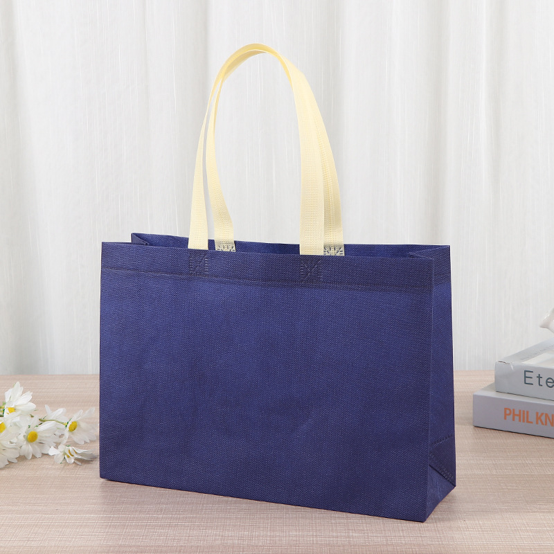 Bolsas de tela no tejida tiendas de souvenirs de viajes de madres y bebés en línea bolsa de compras de mano engrosada bolsa de mano image 12