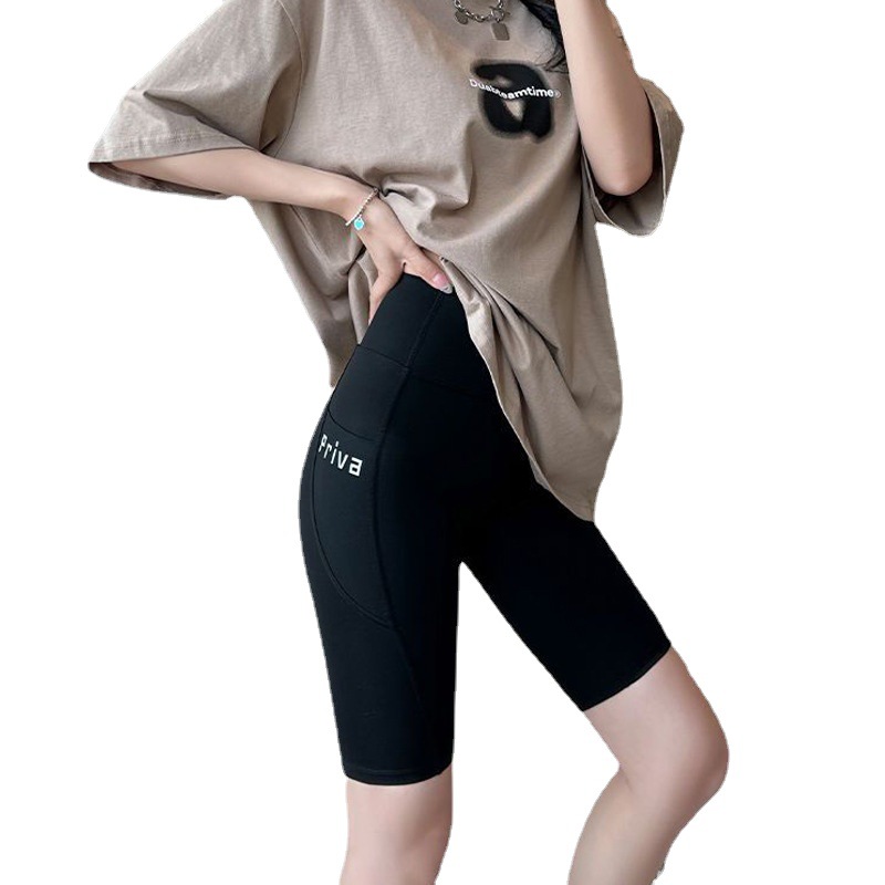 Verano delgado de cinco puntos pantalones de tiburón desgaste exterior de las mujeres bolsillo pantalones cortos vientre contracción cadera levantamiento Barbie polainas de las mujeres