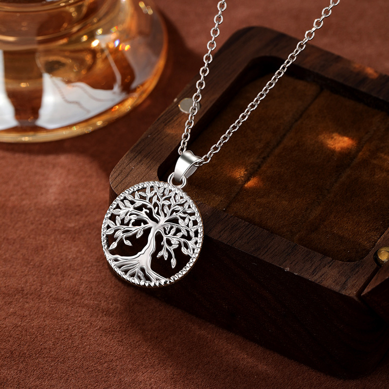 Europeo y americano transfronterizo S925 plata esterlina hueca árbol de la vida colgante retro moda collar de plata fábrica femenina al por mayor