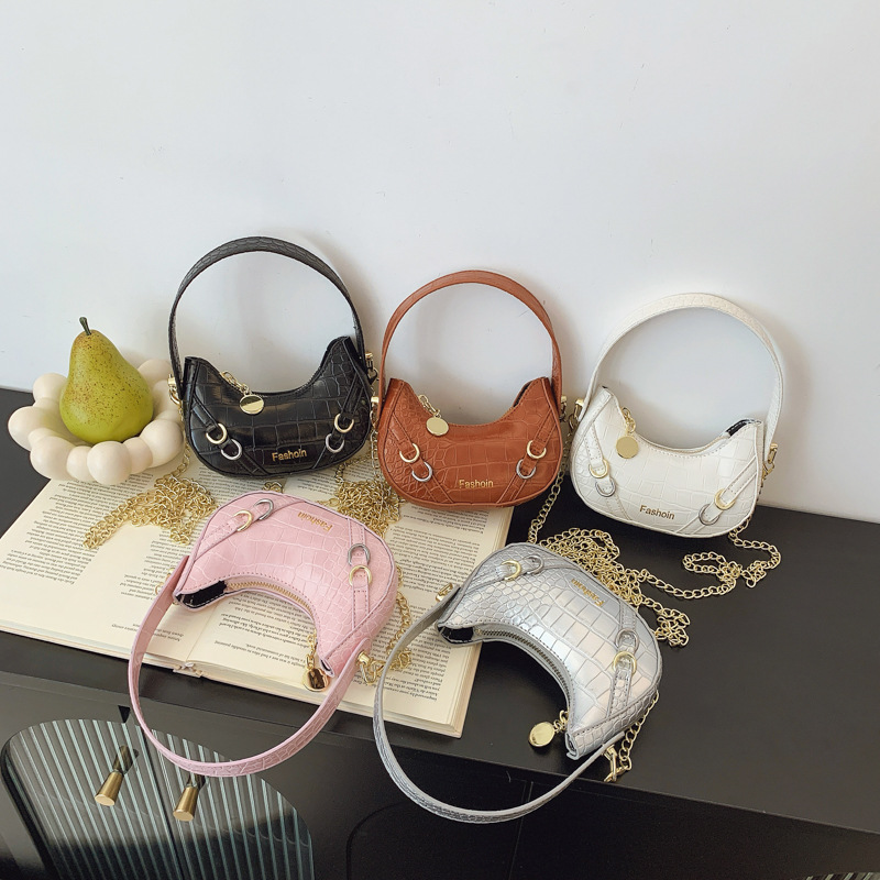 Bolso para niños coreano piedra simple bolso de hombro para bebés de color sólido 2025 nuevo bolso para niñas debajo de la axila