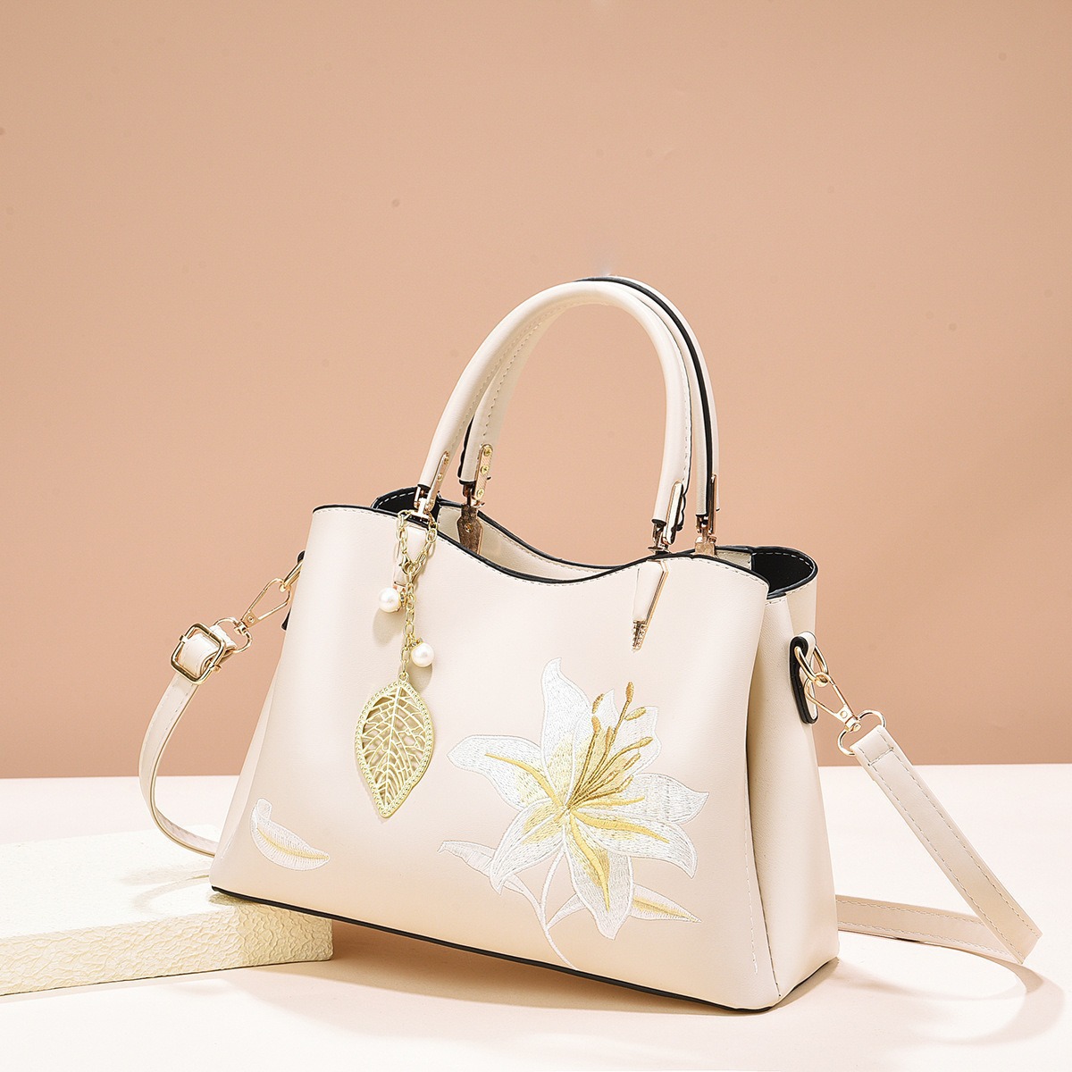 Regalo del Día de la Madre 2025 nuevo estilo de alta sensación de bordado bolso portátil bolso de moda para mujeres de mediana edad
