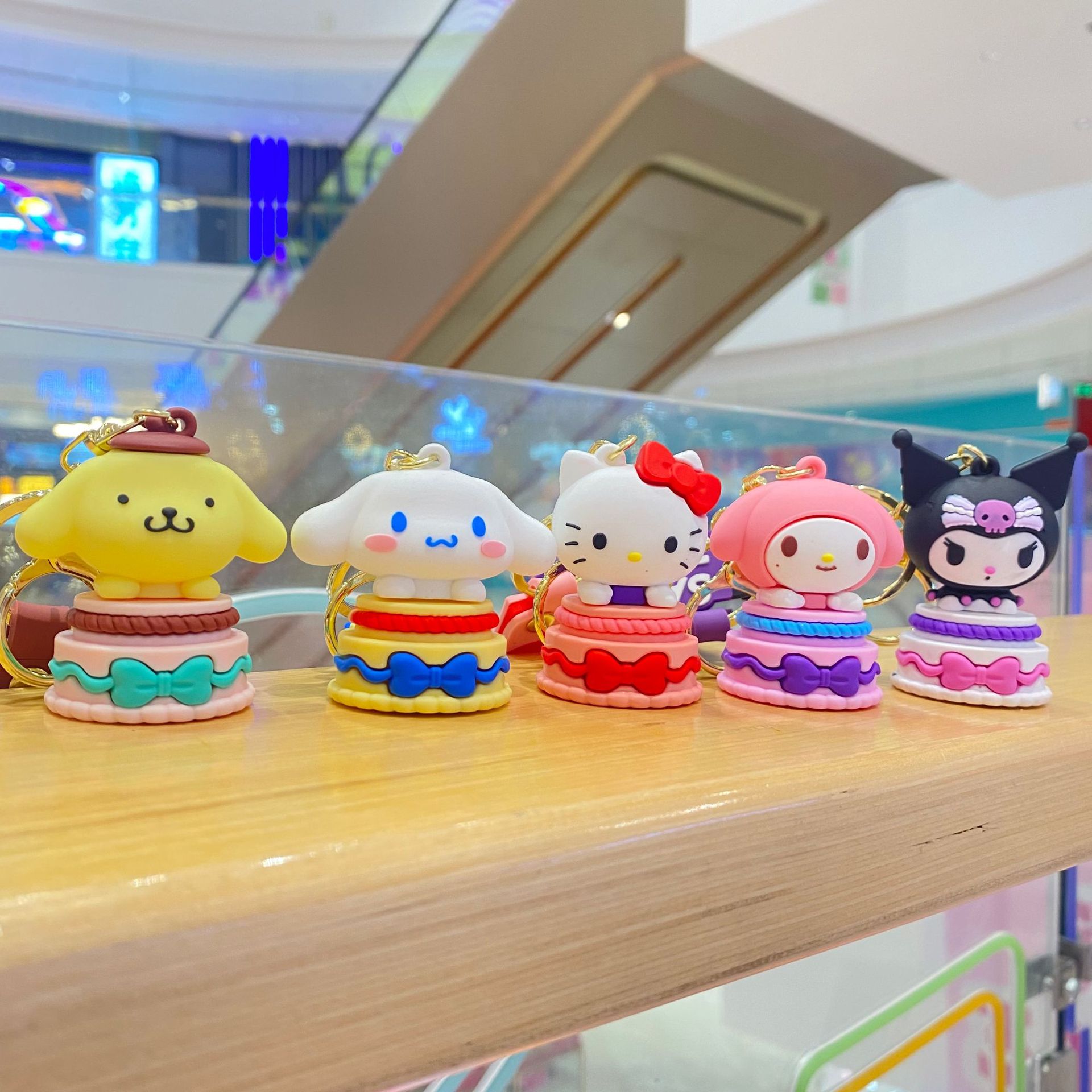 Pastel creativo Sanrio llavero de dibujos animados mochila colgante curación ins pareja muñeca máquina pequeño regalo al por mayor