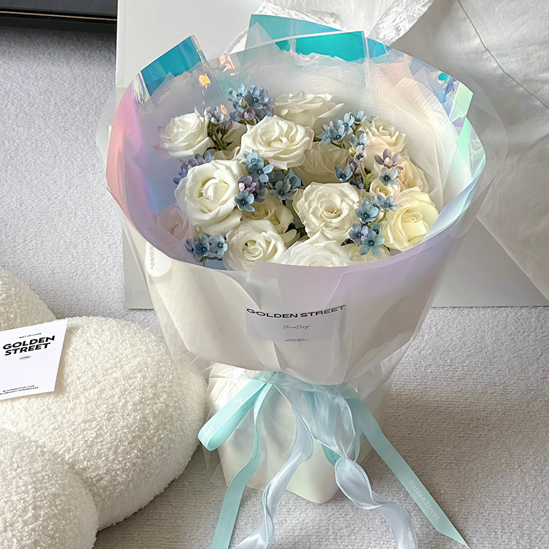 Huaxi Qixi día de San Valentín maravilloso país de la luz colorido papel de embalaje ramo de flores envoltura de gel de película impermeable flor florística florista