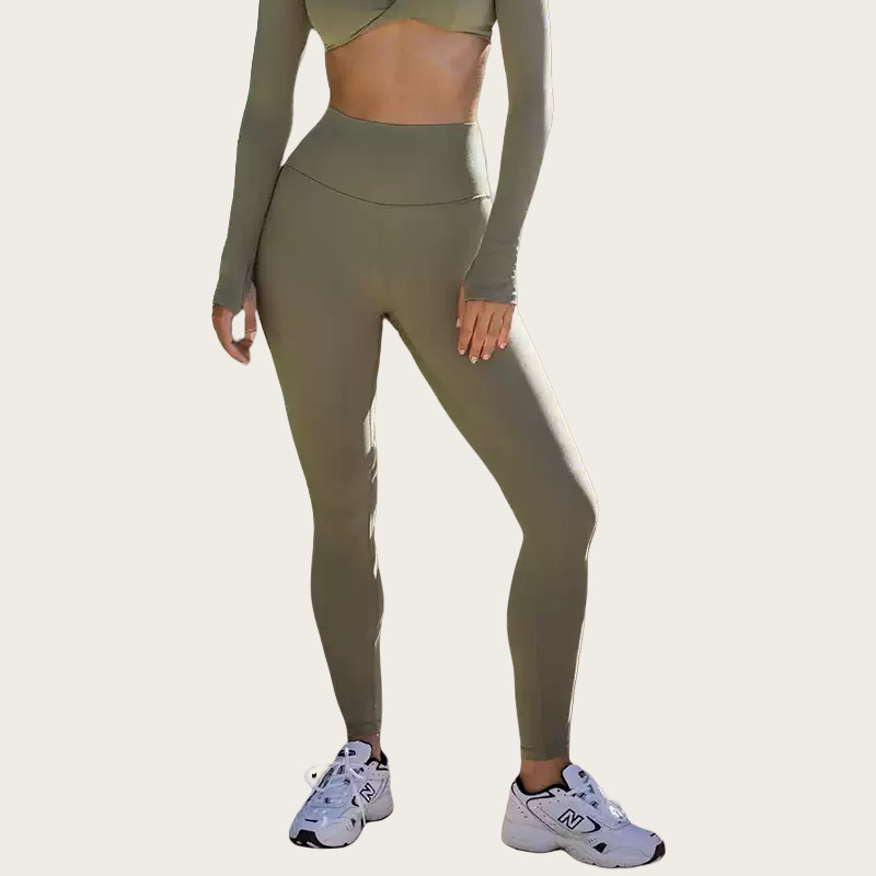 Pantalones de compresión de cadera transpirables y cómodos para eliminar el sudor. Pantalones de yoga de nueve puntos. Pantalones deportivos para correr.