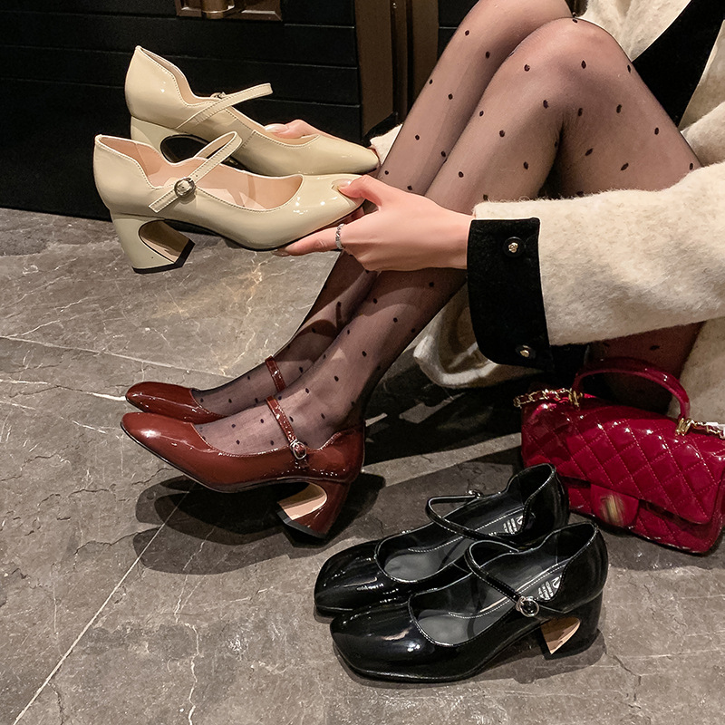 Elegant red Mary Jane shoes with a strap