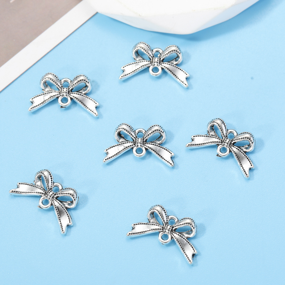 DIY合金饰品配件批发 精致双吊蝴蝶结领结吊坠挂件项链耳配饰材料