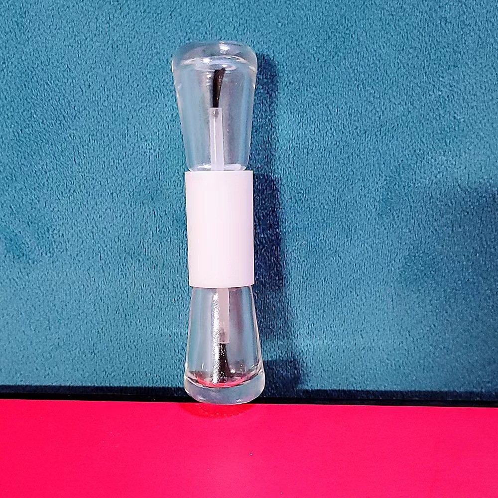 Botella de esmalte de uñas de dos cabezas Botella de pegamento para colorear productos para el cuidado de la piel Botella de maquillaje de subempaque Botella de brillo de labios portátil líquido de diferentes propiedades