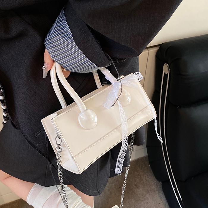 2025 verano venta caliente nuevo bolso cuadrado pequeño portátil moda todo fósforo bolso de mensajero de un solo hombro diseño de nicho bolso femenino de moda