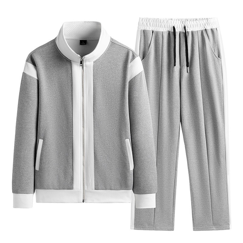 Trajes deportivos de ocio transfronterizos de primavera y otoño para hombres chaqueta de tendencia de empalme para hombres chaqueta de camiseta de dos piezas de pantalones de comercio exterior