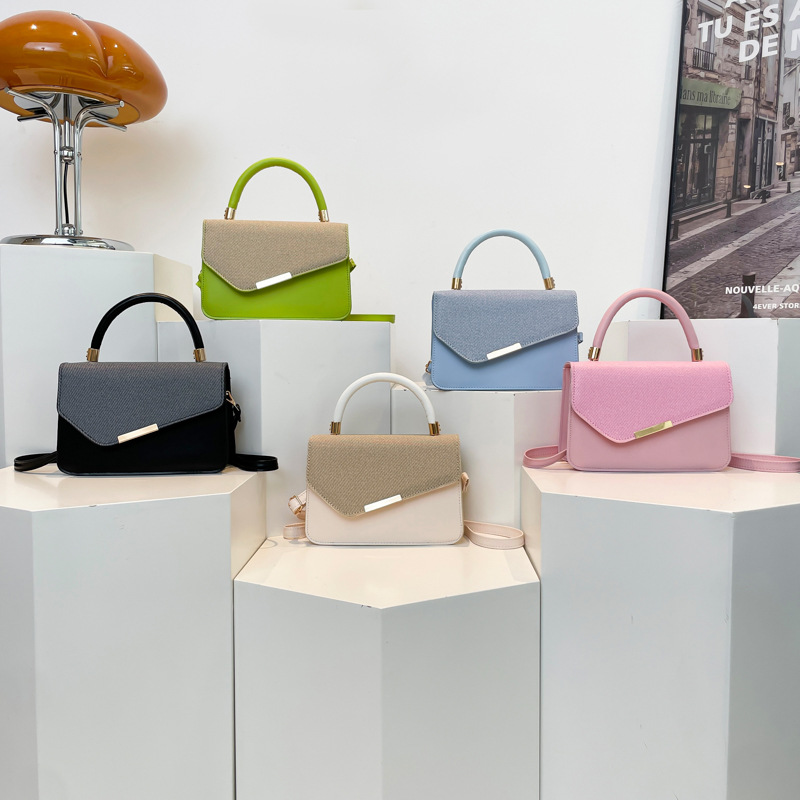 Bolso de mujer transfronterizo 2025 nuevo bolso de mujer ligero de lujo empalme estilo estilo de moda texturas de color bolso de mano