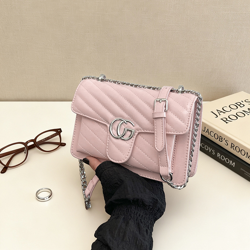 Comercio exterior bolso de explosión simple retro ondulado bolso de amor bolso de hombro para mujeres sensación de diseño de lujo ligero