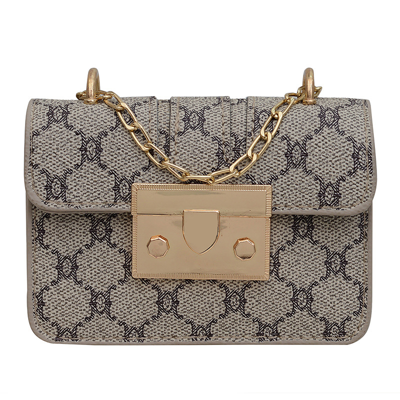 Commuting mini lápiz labial bolso de mano primavera y verano 2023 nueva cadena de moda bolso de hombro impresión retrógrada oblicuo bolso de tendencia