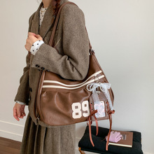 千禧风包包女2025新款潮小众时尚双肩背包大容量单肩托特包通勤包