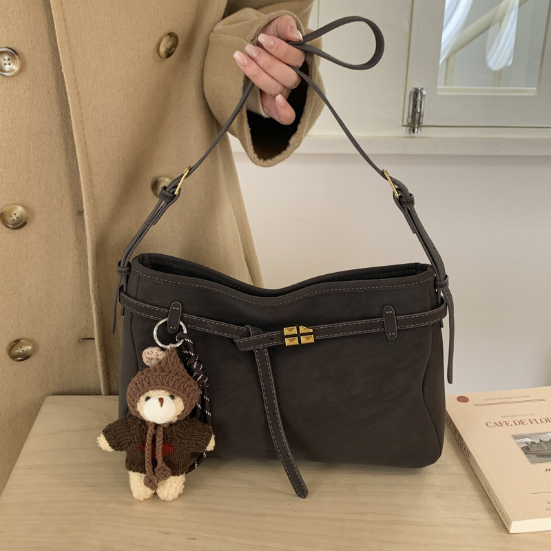 Bolsa retro de hombro debajo de la axila para mujeres 2025, otoño y invierno, nuevo estilo de alta sensación de mochila coreana, bolso de viaje al trabajo