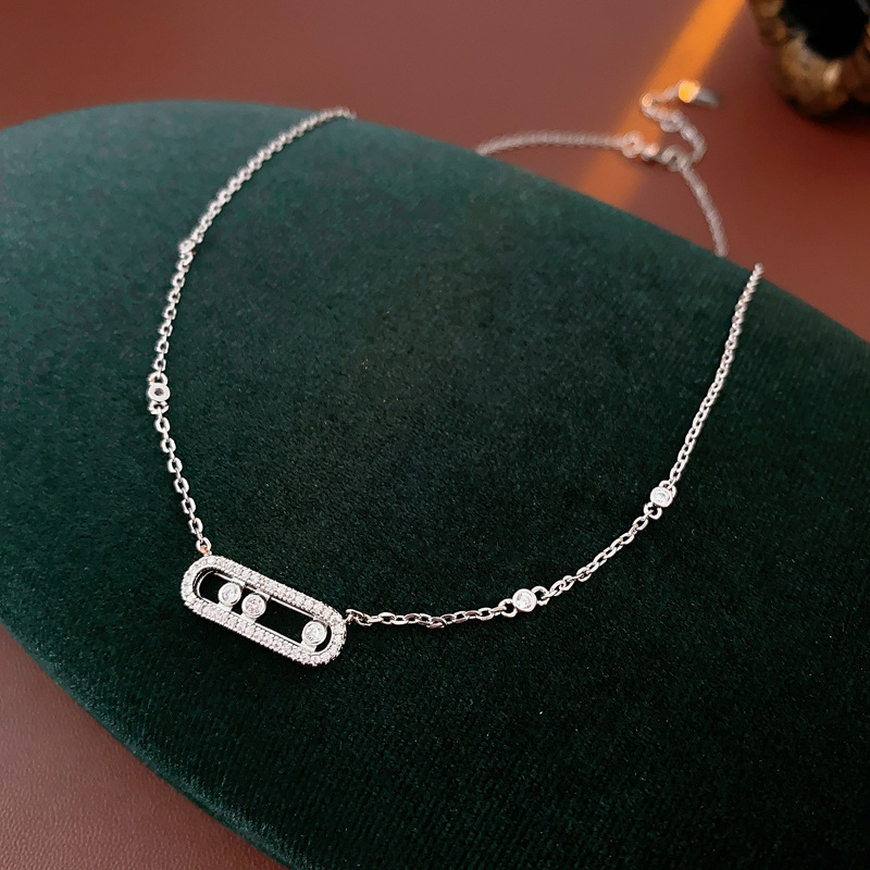 Zircon hueco deslizante collar elíptico ligero lujo frío viento delicado pulsera alta sensación de moda conjunto de joyería mujer