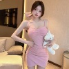 Sexy solid color suspender dress with buttocks and irregular short skirt