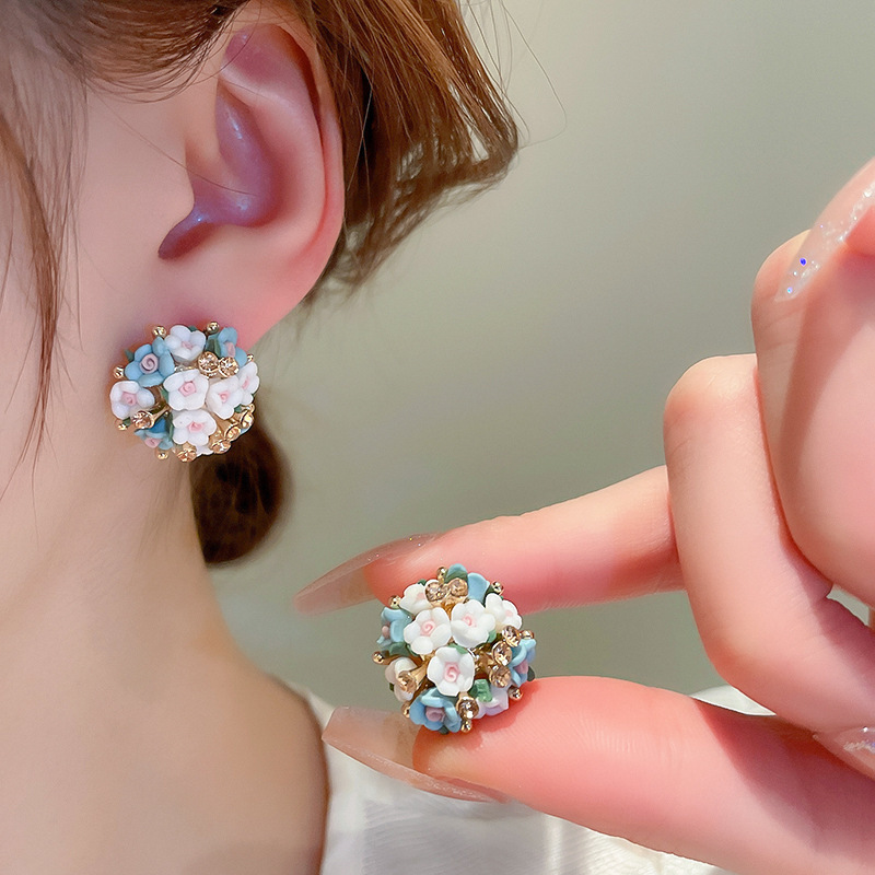 Pendientes de borla de flor de súper hada de plata Pendientes de ins pequeños frescos y dulces Personalidad de moda Pendientes de alta gama al por mayor