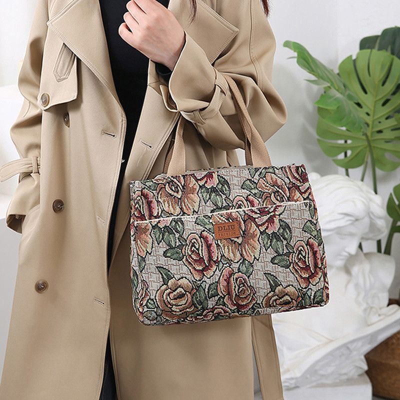 This retro handbag features a tote flower oil painting style. It's convenient to carry a lunch box to work. It has a large capacity and is a mommy bag for going out Item Picture