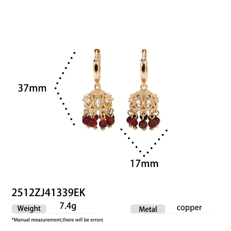 Europa y los Estados Unidos retro luces de palacio de viento aretes incrustados con zircon piedra de ojo de tigre rojo ágata brilla colgante otoño y invierno pernos