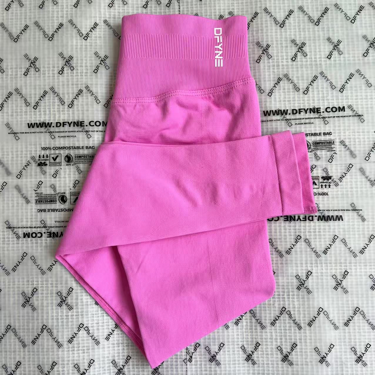 Aliexpress nuevo DFYNE mangas cortas mate nylon alta elástica cuerpo apretado sin bordas de acondicionamiento deportivo T mangas cortas
