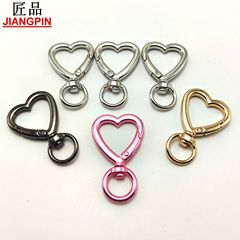 合金の現物のハート型の赤い桃の愛のスプリングリングの装飾品の回転のキーホルダーのチェーンのDIYの部品
