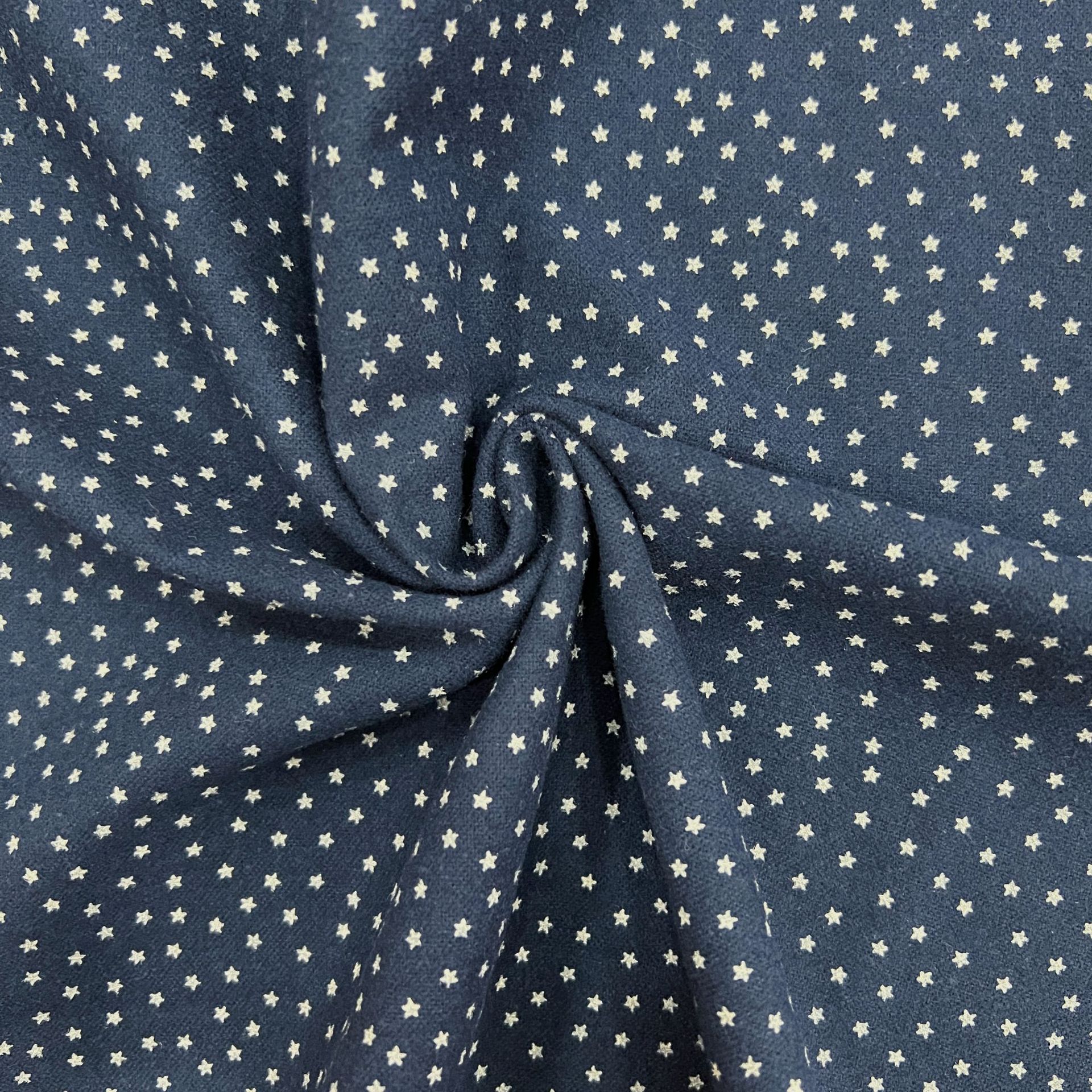 全棉印花磨毛布料 可爱秋冬小星星法兰绒印花童装时装连衣裙面料