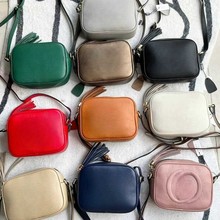 爆款女士斜挎包纯色荔枝纹真皮拉链相机包时尚简约流苏包单肩女包