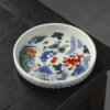 Blue and white underglaze fish and algae pattern pot holder