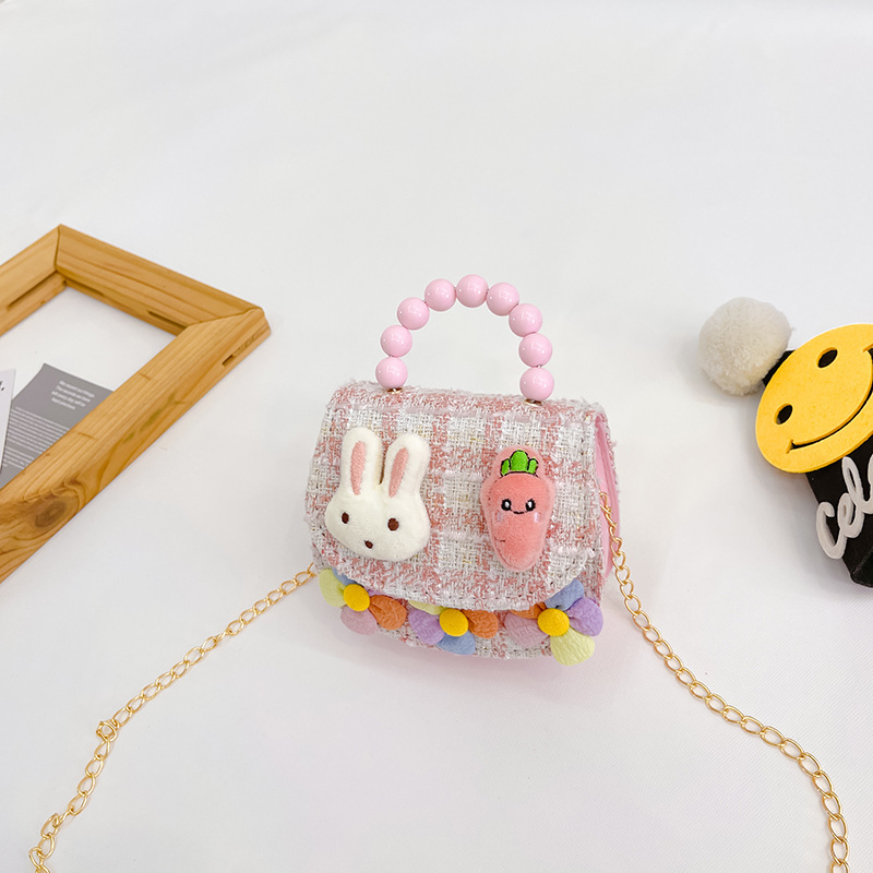 2022 nuevos niños bolso de hombro crossbody Chanel estilo niñas bolsa perla portátil accesorios de dibujos animados bolsa de desgaste