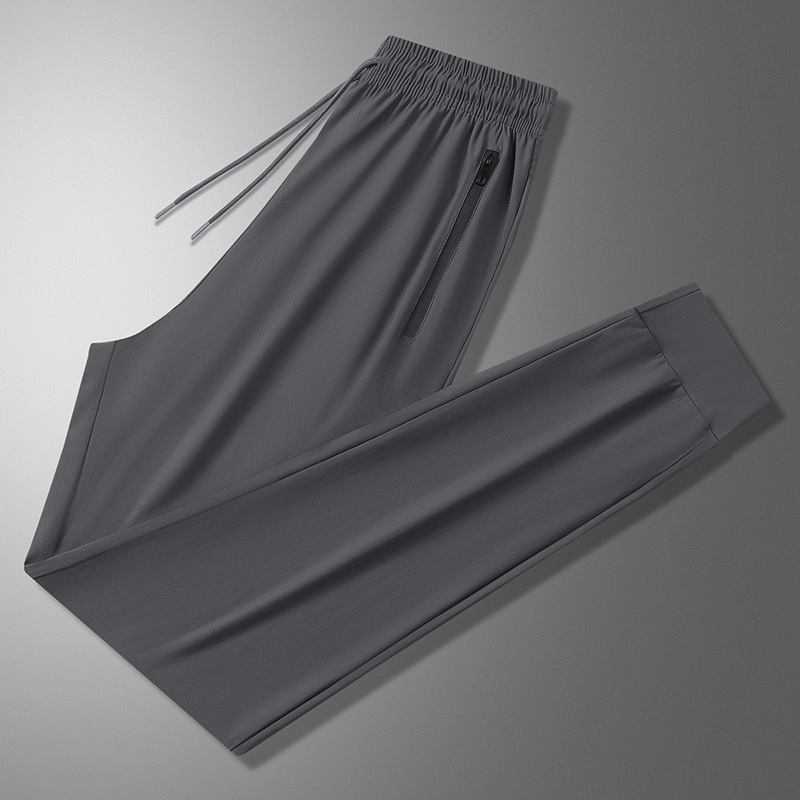 Pantalones de verano para hombres pantalones casuales pantalones deportivos sueltos nuevos tipos coreanos de hielo húmedo delgado pantalones de aire acondicionado pantalones