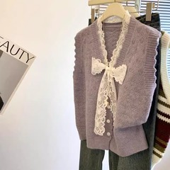 小香風の甘いレースの蝶結びの純色のセーターの馬甲の女性の春秋の金の怠惰な風の柔らかいモチモチとしているニット
