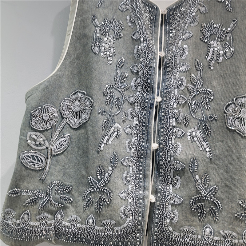 2026 primavera nueva ropa de mujer nuevo diseño chaleco de mujer retro industria pesada bordado plegable a través de hombro clips