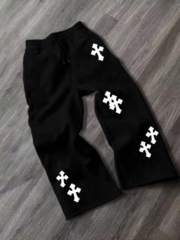 Calle transfronteriza europea y americana, tendencia retro americana, pantalones rectos sueltos, pantalones negros con estampado cruzado casual, hombres