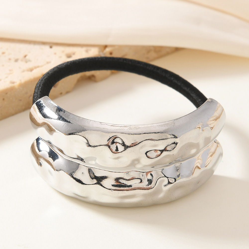 Viento frío europeo y americano, metal geométrico, anillo para el cabello elástico cóncavo y convexo, nuevo anillo para el cabello líquido de temperamento, cuerda para el cabello de alta elasticidad de todo fósforo