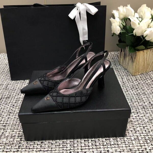 Elegant fashionable high heels with diamond pattern pointed-toe made…