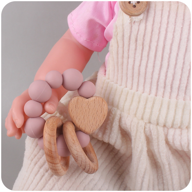 Nuevos suministros para bebés Beech Cartoon Love calmante bebé de silicona mordedura molar Beech Toy teether