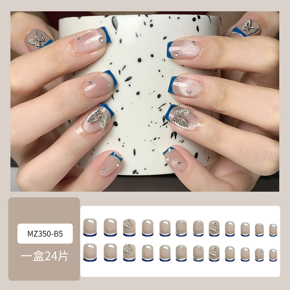 Uñas de desgaste hecho a mano al por mayor Pequeño Libro Rojo TikTok flash plata caliente mariposa pieza de uñas parche de uñas portátil