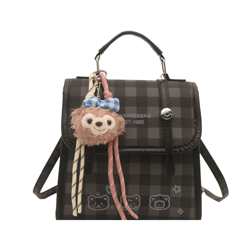 Modelo coreano de moda retro estriado mochila de hombro mujer2026 textura alta temperamento versátil mochila casual