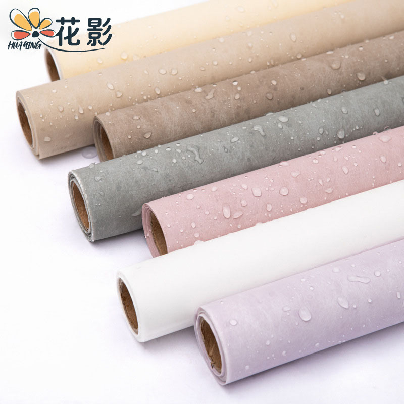 Venta al por mayor de Corea nueva tecnología negro algodón papel enrollado material FORRO impermeable leche algodón actualizado flor material de embalaje