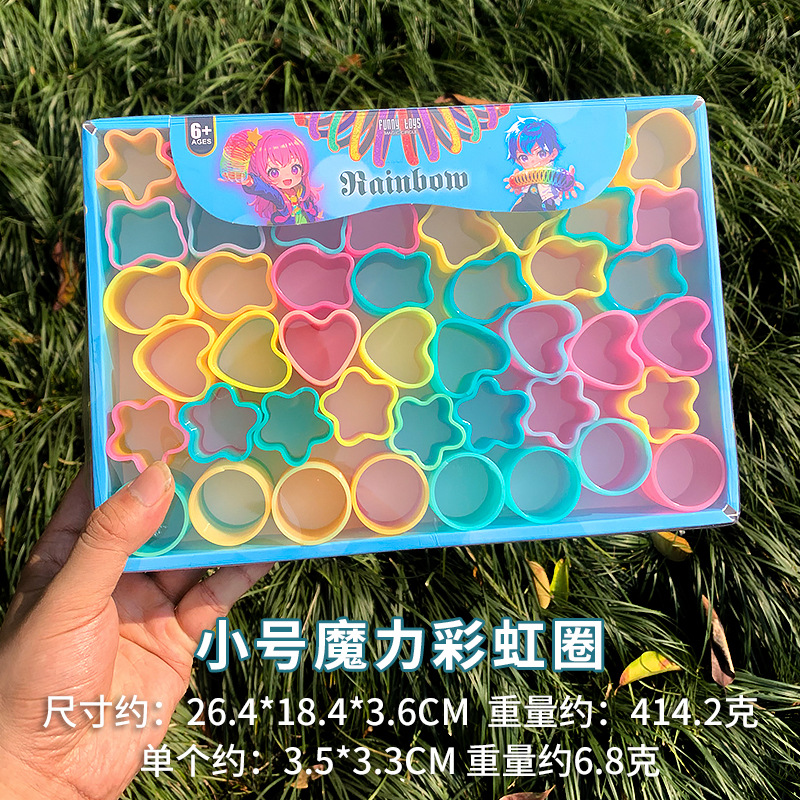 Heart-shaped magic rainbow ring mini spring ring telescopic stacking elastic ring to push hot selling small toys gifts wholesale